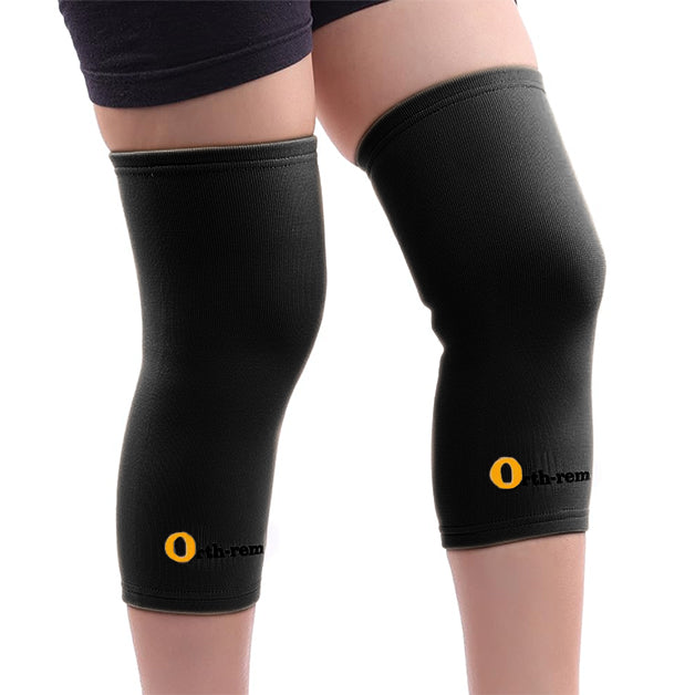 Elastic knee support sleeves for joint stability and muscle compression.
